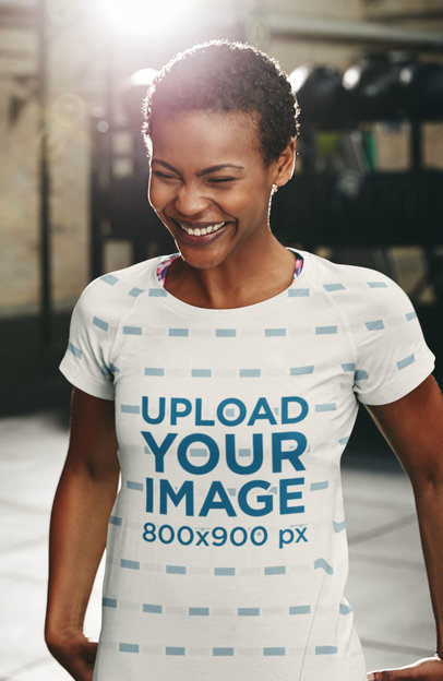 Sublimated T-Shirt Mockup of a Cheerful Woman at the Gym