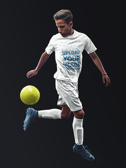 Custom Soccer Jerseys - Teen Playing with Ball Against Solid Background