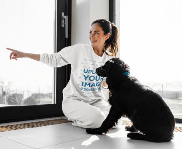 Sweatshirt Mockup of a Woman Playing With a Dog
