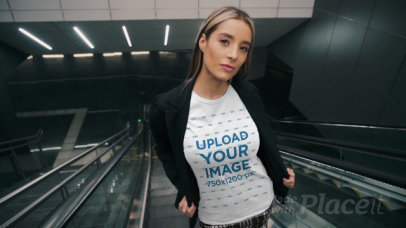 T-Shirt Video of a Cool Woman on an Escalator