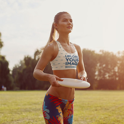 Sports Bra Mockup of a Woman with a Frisbee-Style Flying Disc