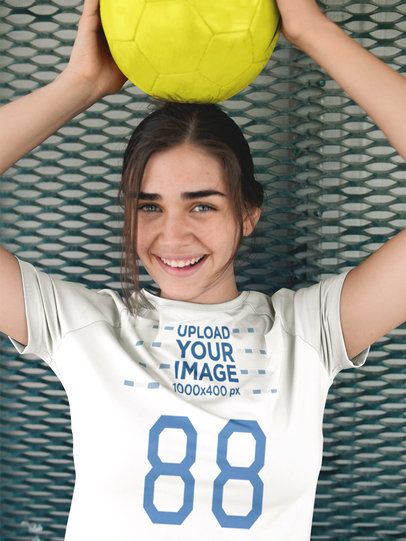 Custom Soccer Jerseys - Beautiful Girl Holding Ball on her Head