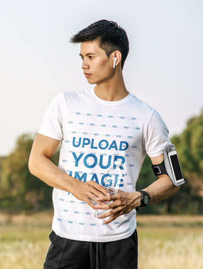 T-Shirt Mockup of a Runner with Headphones Holding a Water Bottle m4687 r-el2