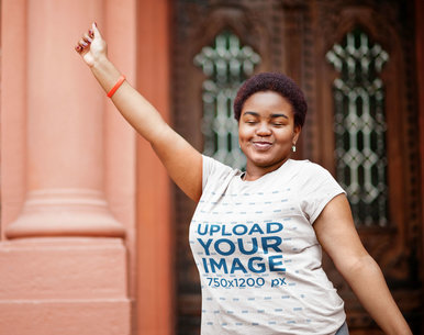 Round-Neck T-Shirt Mockup Featuring a Happy Woman With an Afro Hairstyle