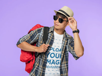 Round-Neck T-Shirt Mockup Featuring a Man With Sunglasses Getting Ready to Travel m4686 r-el2
