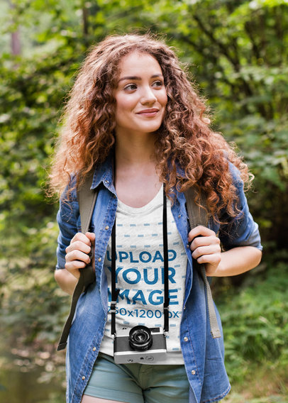 V-Neck Tee Mockup of an Adventurous Photographer in the Woods