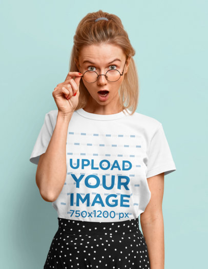Round-Neck Tee Mockup Featuring a Woman with a Surprise Expression
