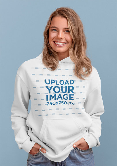 Pullover Hoodie Mockup Featuring a Smiling Young Woman in a Studio