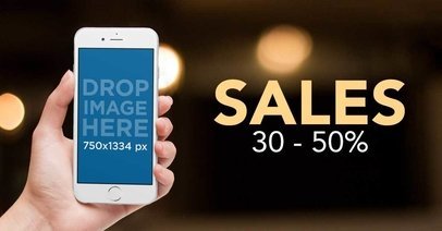 Facebook Ad Mockup of a White iPhone Being Held Against a Blurry Background