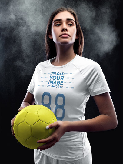 Custom Soccer Jerseys - Girl Holding the Ball on Powerful Pose