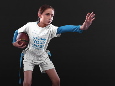 Custom Football Jerseys - Little Angry Girl Holding the Ball Inside the Studio