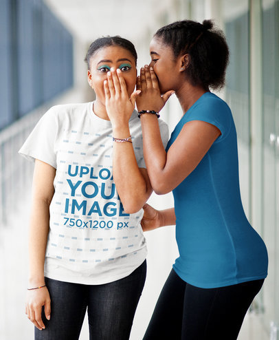 T-Shirt Mockup of Two Young Women Gossiping in a School Hallway