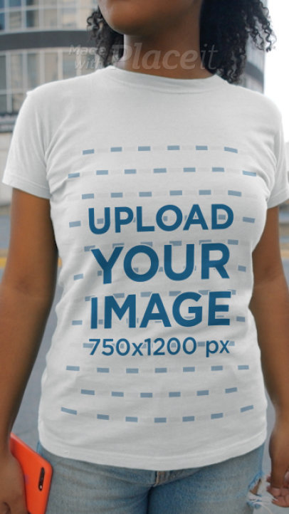 Video of a Happy Woman Wearing a T-Shirt in the City