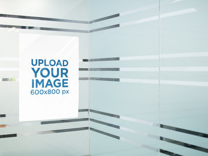 Poster Mockup on a Decorated Office Glass