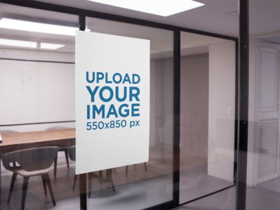 Mockup of a Poster on a Glass Wall