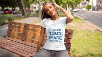 T-Shirt Video Featuring a Long-Haired Woman Sitting On a Park Bench 