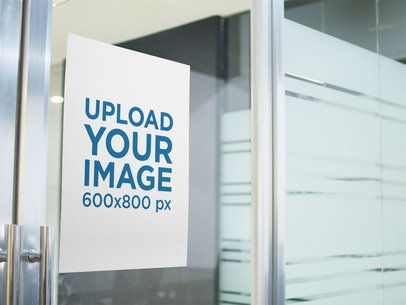 Poster Mockup on a Glass Door