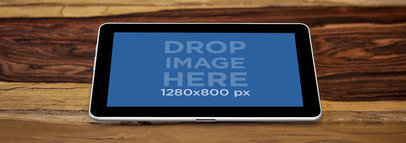 Wide Mockup of a Samsung Galaxy Tablet on a Table