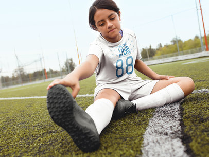 Custom Soccer Jerseys - Girl Streching at the Field
