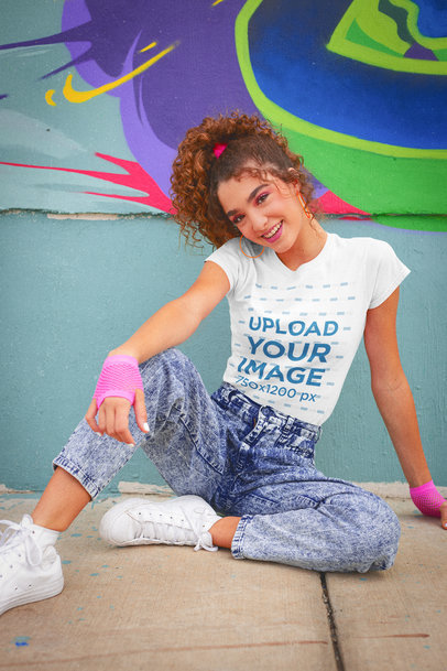 T-Shirt Mockup of a Young Woman with an '80s-Styled Outfit