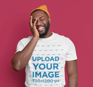 Round-Neck Tee Mockup of a Bearded Man with a Beanie Touching His Face