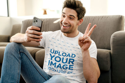 T-Shirt Mockup Featuring a Happy Man Taking a Selfie Making a Peace Sign M11003-r-el2