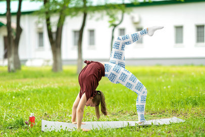 Sublimated Leggings Mockup of a Young Woman Doing Yoga at a Park m11309-r-el2