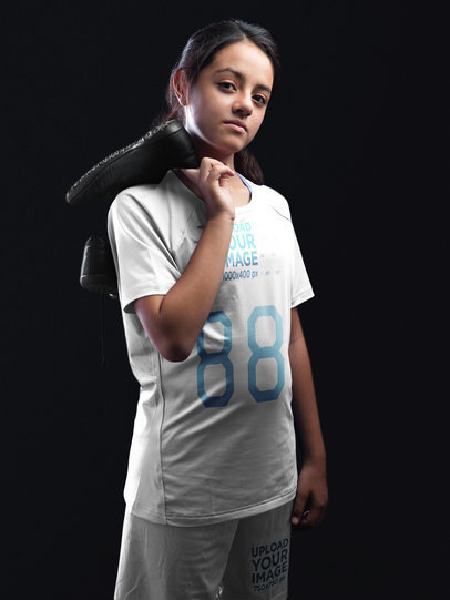 Custom Soccer Jerseys - Girl Holding her Shoes