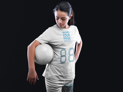 Custom Soccer Jerseys - Girl Holding a Ball at the Studio