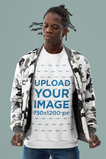 Sweatshirt Mockup of a Stylish Man Standing in a Studio