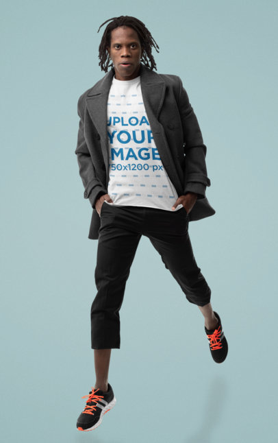 T-Shirt Mockup of a Fashionable Man Doing a Small Jump