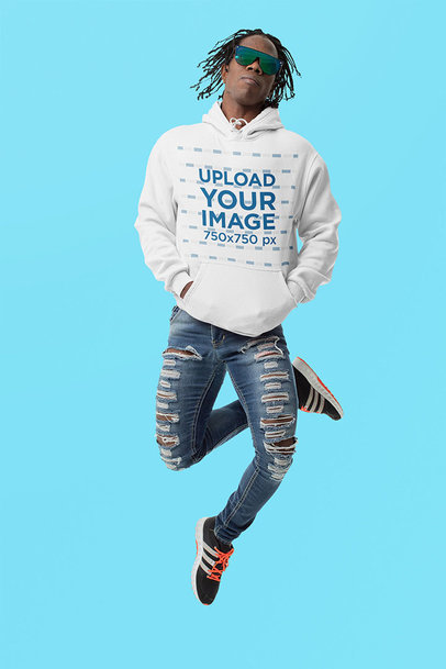 Hoodie Mockup of a Man With Sunglasses Jumping Against a Solid Color Backdrop m10776