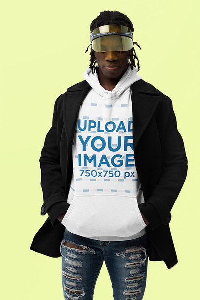 Mockup of a Fashionable Man Wearing a Hoodie in a Studio