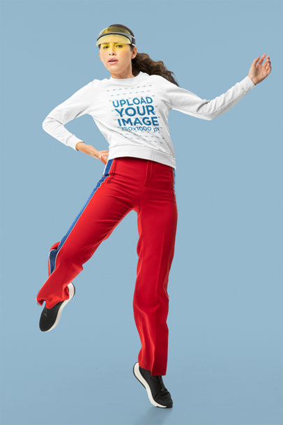 Sweatshirt Mockup Featuring a Woman Posing in a Studio