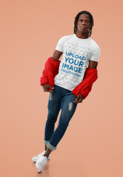 Basic T-Shirt Mockup Featuring a Serious Man Against a Plain Backdrop