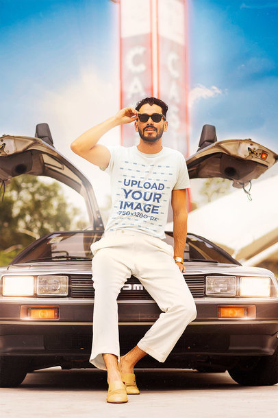 Retro-Themed T-Shirt Mockup of a Man Posing with a Cool Car