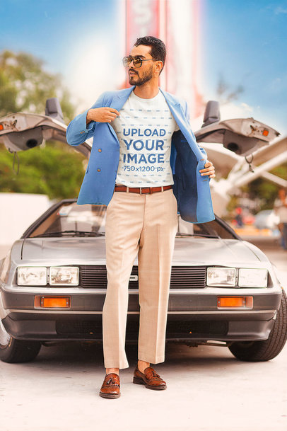 T-Shirt Mockup of a Stylish Man Posing by a Retro Car 