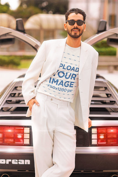 Retro-Styled T-Shirt Mockup Featuring a Bearded Man Leaning Against a Vintage Car