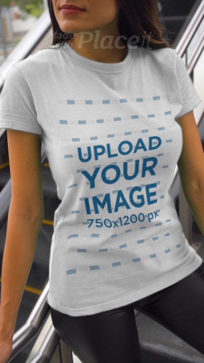 Video of a Woman Wearing a Basic T-Shirt While Posing on a Staircase