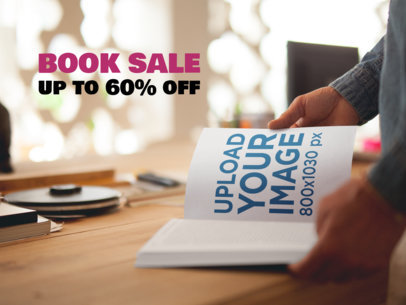 eBook Ads - Book Being Read on a Wooden Table