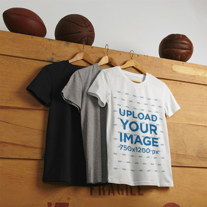 Mockup of Three T-Shirts on Wooden Hangers