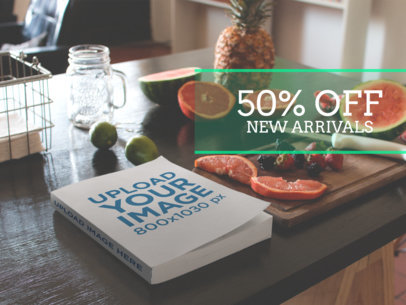 eBook Ads - Book Lying on a Kitchen Table Next to Fruits and Knife a16565