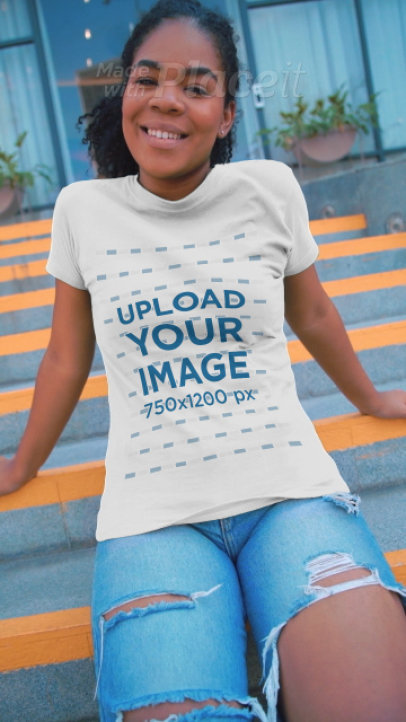 T-Shirt Video Featuring a Young Woman Posing in an Urban Setting