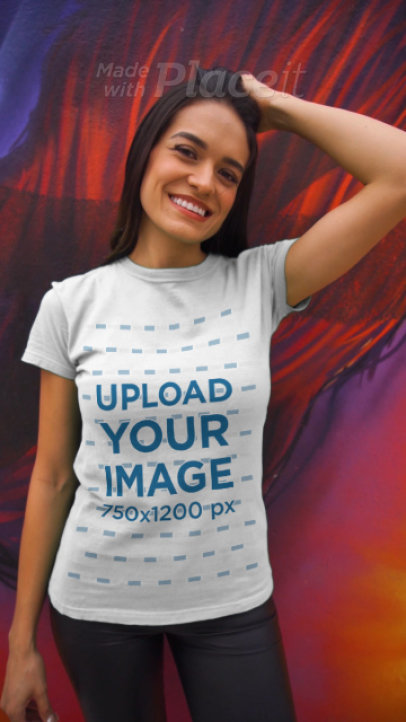 T-Shirt Video Featuring a Woman Posing Next to a Graffiti Wall 