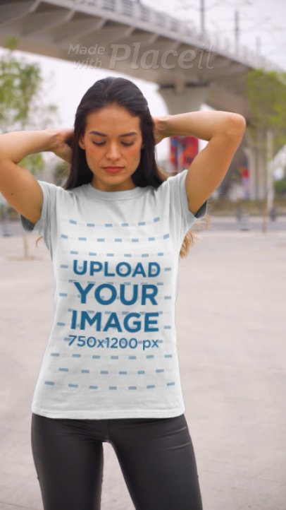 T-Shirt Video of a Young Woman Touching Her Hair