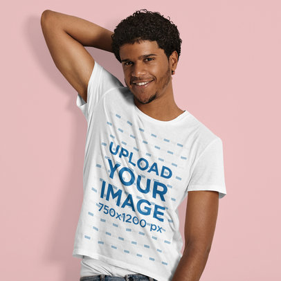 Mockup of a Smiling Man Posing in a Rounded-Neck T-Shirt