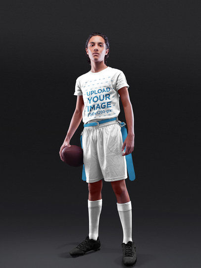 Custom Football Jersey - Young Boy Standing While Holding the Ball