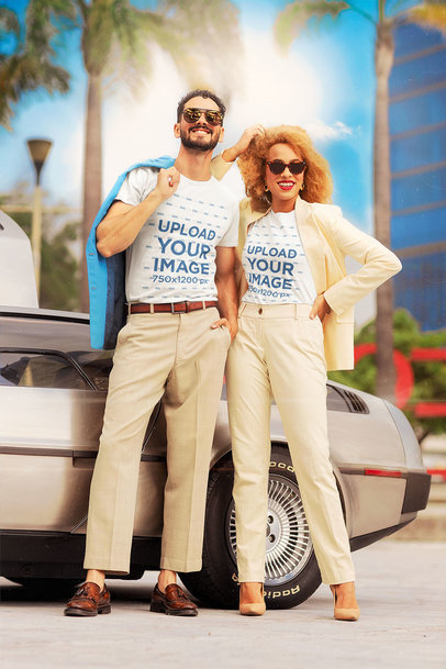 T-Shirt Mockup of a Couple with Miami Vice-Inspired Outfits by a Classical Car
