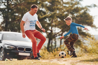 V-Neck T-Shirt Mockup Featuring a Dad Playing Soccer with His Son
