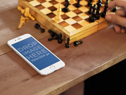 Mockup of an iPhone 6 at a Chess Game